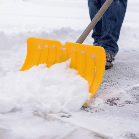 Shoveling snow in winter